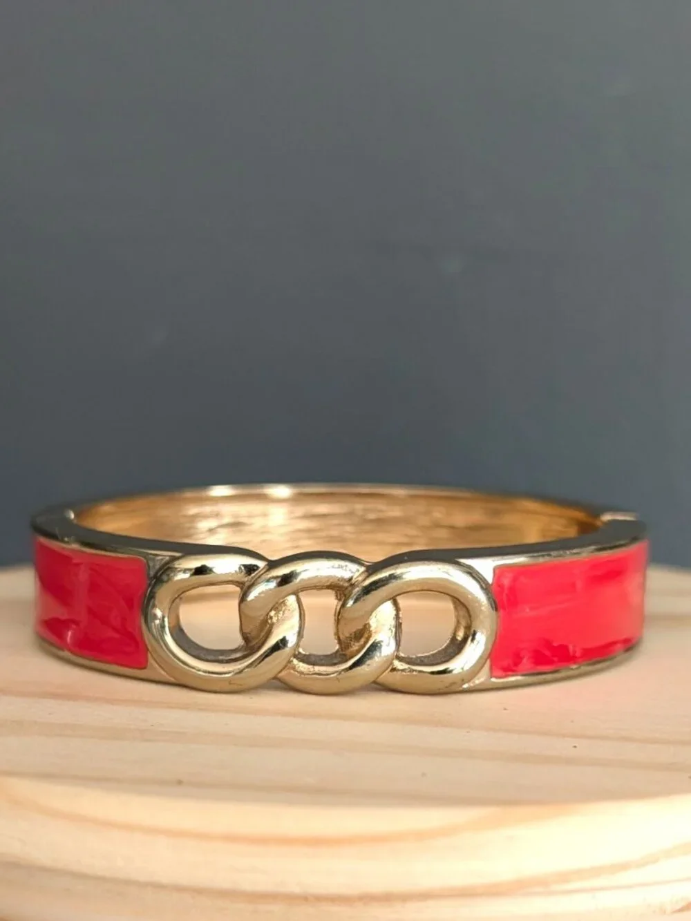 Gold and orange enamel bangle